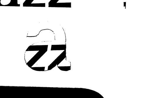 Close-up de la construction typographique, contours vibrants